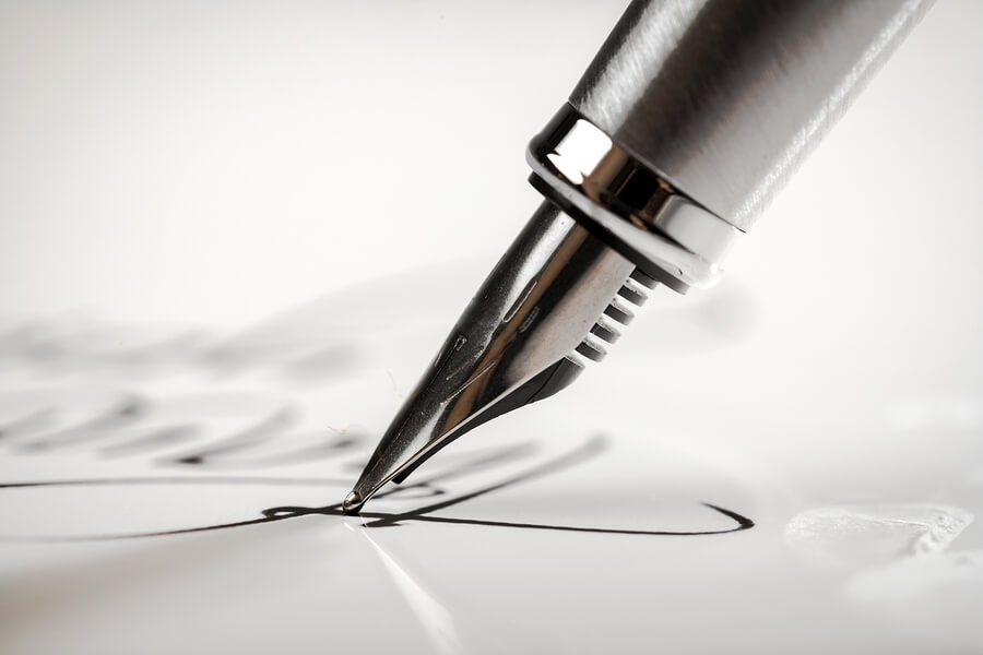 A pen performing a signature