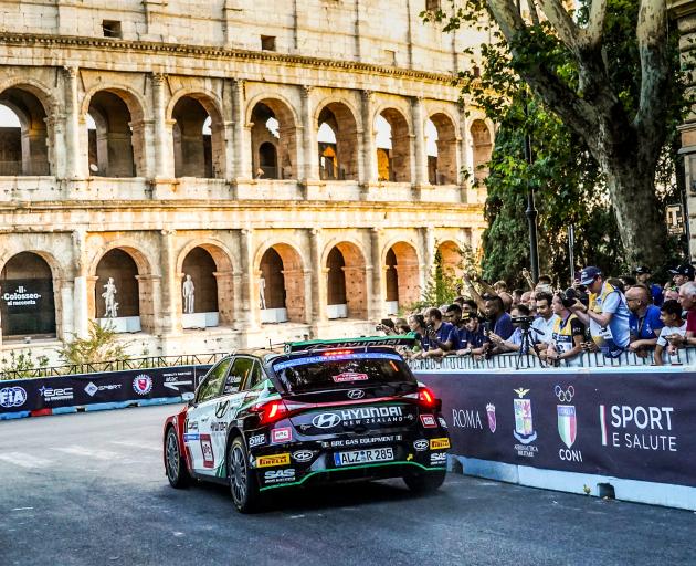 New Zealand rally driver Hayden Paddon prepares to go round the Colosseum as he competes in the...