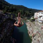 A man jumps from a 17m bridge during a diving exhibition, in Kanal, Slovenia. PHOTOS: REUTERS