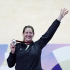 New Zealand's Anna Taylor celebrates with her silver medal on the podium. Photo: Reuters 