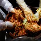 Lee Ha-yeon, a recognized kimchi grand master and her apprentices prepare kimchi at the Kimchi...