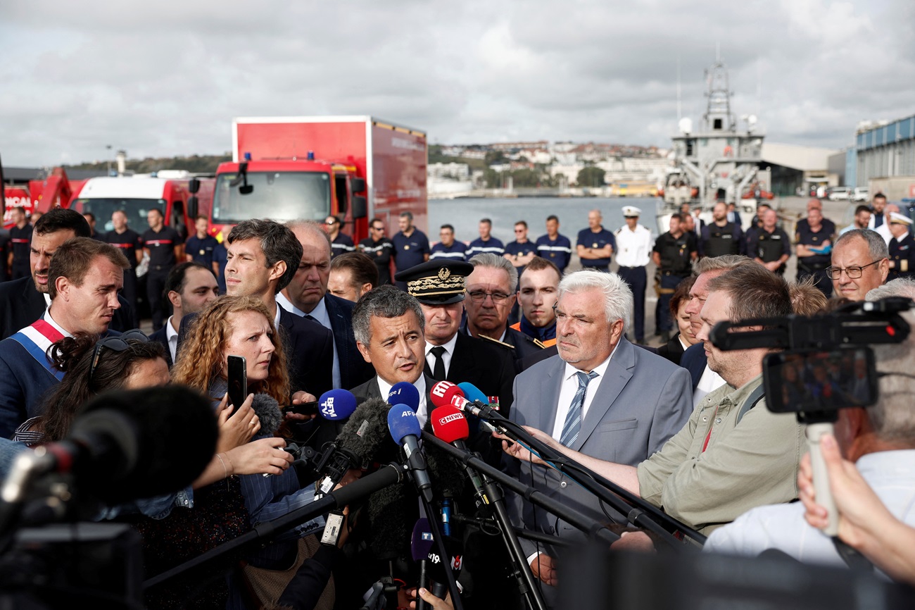 French Interior Minister Gerald Darmanin speaks to media in Boulogne-sur-Mer after the capsize....