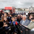 French Interior Minister Gerald Darmanin speaks to media in Boulogne-sur-Mer after the capsize....