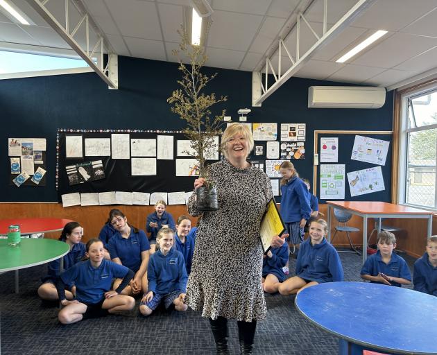 Millers Flat School principal Hilary Spedding celebrates the school winning the top Enviroschools...