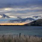 Giant albatross appears in the clouds over the harbour entrance