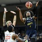 Otago Nuggets forward Kimani Lawrence goes up for a rebound during an NBL game against the...