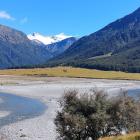 Four mountains reveal themselves as you advance up the Matukituki Valley. Photo: Clare Fraser