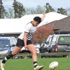 Balclutha rugby league player Kairus Booth, 16, practises goalkicking in Balclutha recently....