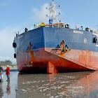 The Manahau may be stuck in the sand for days. Photo: Damer Farrell, Greymouth Star
