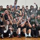 City Rise Bombers players and supporters celebrate victory in the Dunedin men’s club basketball...