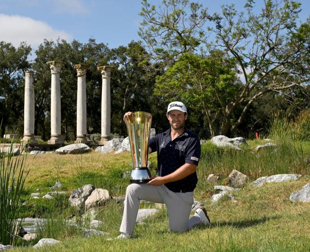 Ben Campbell celebrates victory at the International Series Morocco tournament. PHOTO: ASIAN TOUR