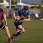 Otago Country lock Dean Sinnamon has Ben Sisson in support as he tries to beat Southland Country...