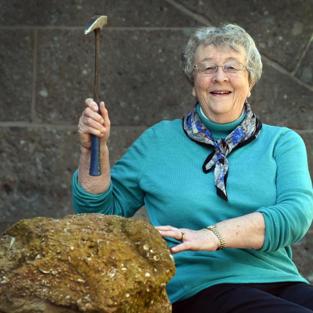 University of Otago geology emeritus professor Daphne Lee with a rock rich in fossils, from...