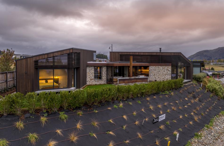 Timber and stone give this Wānaka home a sense of permanence. PHOTOS: JAMIE COBEL