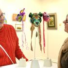 Rhonda Robertson (left), of Oamaru, and Kari Sheat, of Alexandra, admire 'Come into the Garden'...