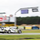 Jordan Michels, of Invercargill, takes the  chequered  flag in his Marc Ford Mustang in the class...