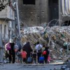 Palestinians carry their belongings as they flee homes in Gaza City. Photo: Reuters 