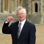 Frank Duckworth poses after he was made a Member of the British Empire (MBE) in 2010. Photo:...