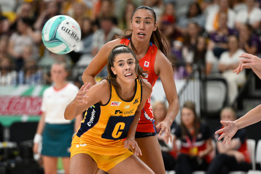 Dakota Thomas (rear) in action for the Swifts against the Lightning on the Gold Coast last year....