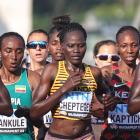 Uganda's Rebecca Cheptegei, centre, competes in the women's marathon final during the World...