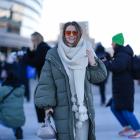 A guest wears a full-length khaki puffer jacket during the Copenhagen Fashion Week earlier this...