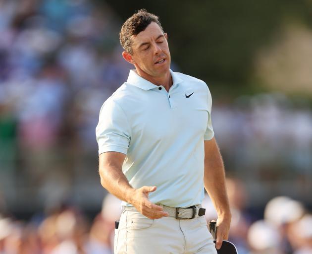 Rory McIlroy missed a short putt to bogey the 18th. Photo: Getty Images