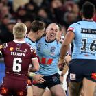 Dylan Edwards of the Blues celebrates after scoring a try in game two of State of Origin at the...