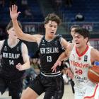 Hayden Jones (13) of New Zealand defends against Kaan Onat of Turkiye during the third place...