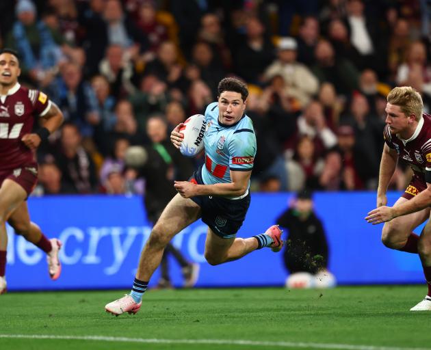 Mitchell Moses escapes the Queensland defence to score. Photo: Getty Images