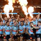 NSW celebrate their State of Origin win in Brisbane. Photo: Getty Images