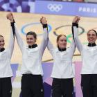 Silver medalists Ally Wollaston, Bryony Botha, Emily Shearman, Nicole Shields pose on the podium...