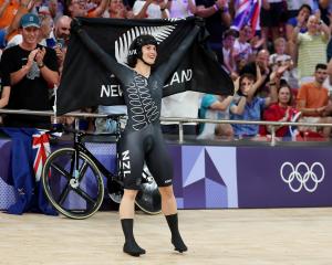 Gold medallist Ellesse Andrews, of New Zealand, celebrates after winning the women’s keirin final...