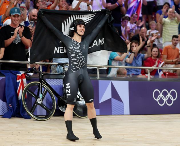 Gold medallist Ellesse Andrews, of New Zealand, celebrates after winning the women’s keirin final...