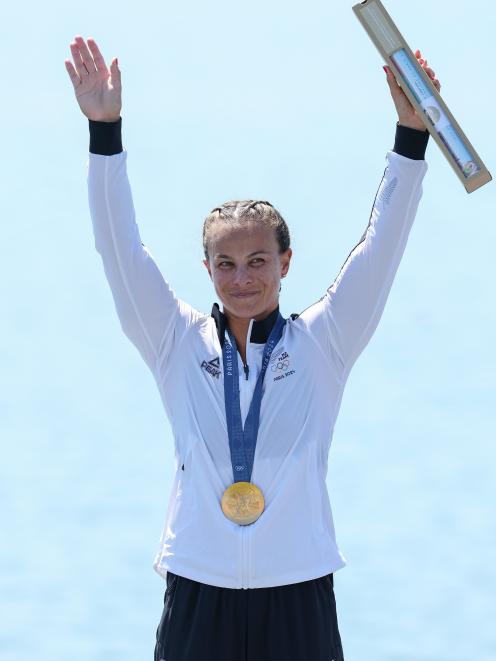 Lisa Carrington acknowledges the crowd during the podium ceremony for the women’s 500m kayak...