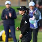 Lydia Ko reacts after sinking the crucial putt which won her the British Women’s Open. PHOTO:...