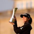 Lydia Ko poses with the trophy following her victory in the Women's British Open. Photo: Getty