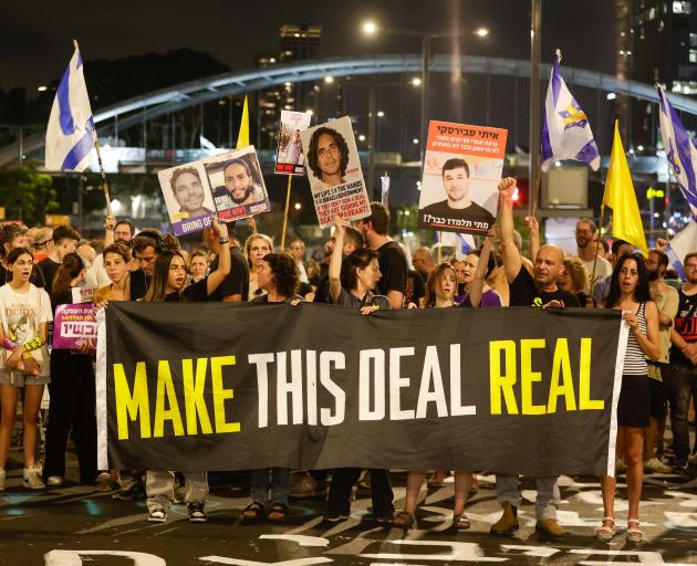 Thousands of Israelis gather in Tel Aviv on September 4, 2024 to protest against Benjamin...