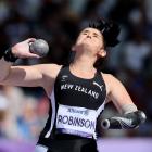 Holly Robinson strives for distance in the F46 shot put final at the Paralympics in Paris. PHOTOS...