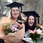 University of Otago graduates Isobel Taylor (left), of Waikato, and Caitlin Braun, of Dunedin,...