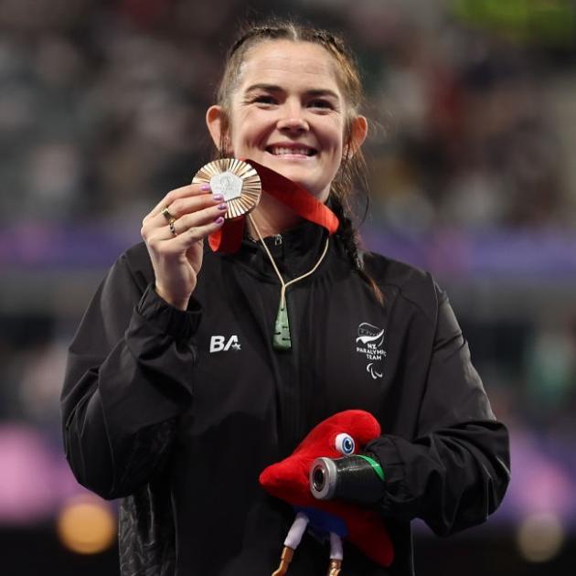 Holly Robinson on the podium with her bronze medal for the Women's Shot Put- F46 final. Photo:...