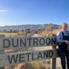 A team effort ... Jan Keeling, pictured laying a predator trap at the Duntroon Wetland, enjoys...