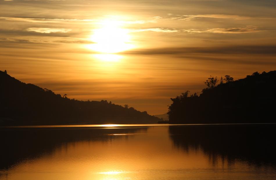 Sunrise over Dunedin Harbour . 9am July 10 J