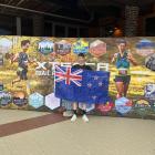 Dunedin runner Dan Hayman flies the New Zealand flag at the Xterra world trail half-marathon...