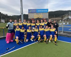 The Taieri Tuataras celebrate their victory in the Otago premier men’s hockey final at the...