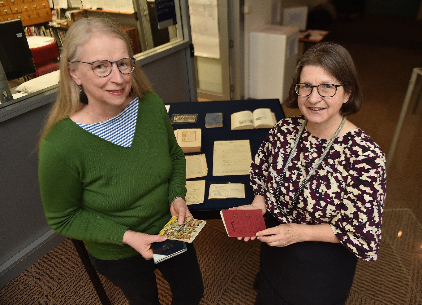 Anna Blackman (left) and Kirstie Ross with Janet Frame ephemera. Photo: Gregor Richardson