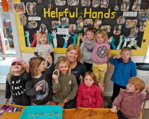 Riverside Educare children have been making friendship bracelets for children in Nepal. From left...