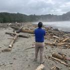 Southland MP Joseph Mooney surveys forestry slash in Tairāwhiti/Gisborne. PHOTO: FACEBOOK