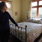 Janet Frame House trustee, Wellington author Kate Camp stands in the Oamaru childhood home of the...