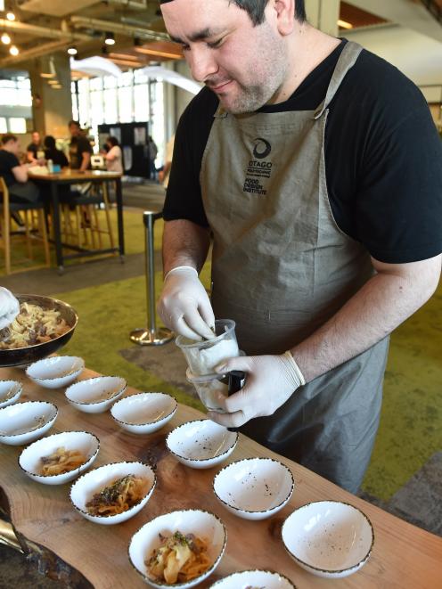 Paul Baker (26) Bachelor of Culinary Arts student plates up Lamb Ragu Pappardelle.