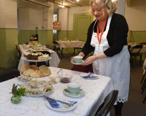 Olveston Historic Home guide Viv Houston serves an afternoon tea in the drying room. PHOTOS:...